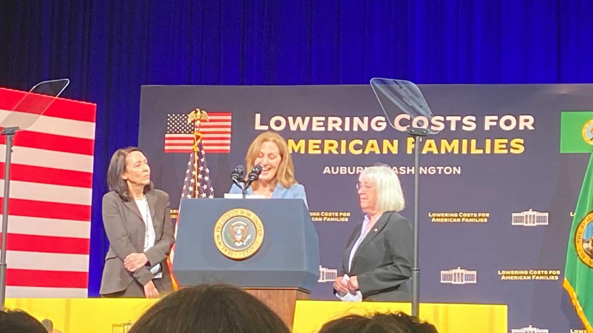 Rep. Schrier on stage with Senators Cantwell and Murray