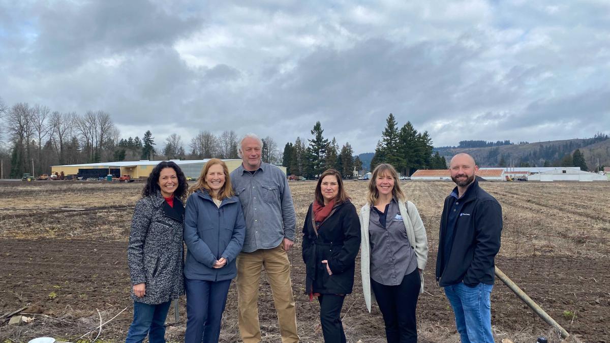Rep. Schrier with farmers