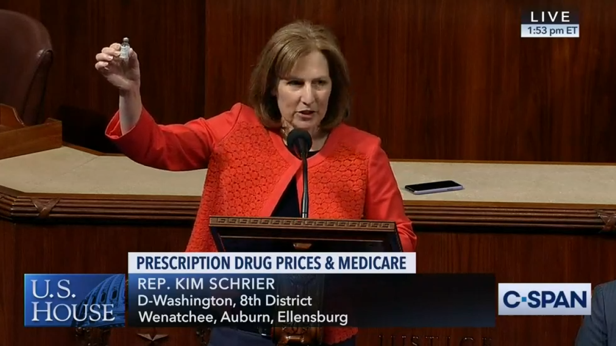 Rep. Schrier holds her insulin vial during her floor speech. Click to watch the speech