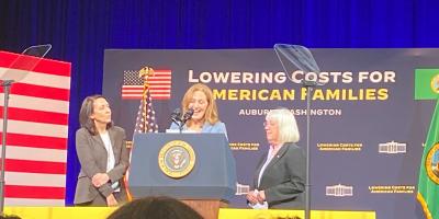 Rep. Schrier on stage with Senators Cantwell and Murray