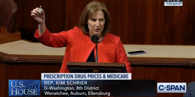 Rep. Schrier holds her insulin vial during her floor speech. Click to watch the speech